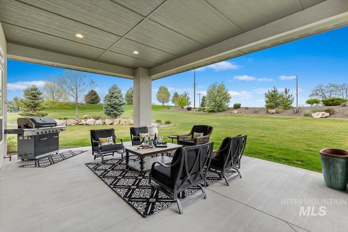 15465 Syrah Court Caldwell, ID 83607 - Photo 5 of 45 View of patio / terrace with a fire pit and a grill