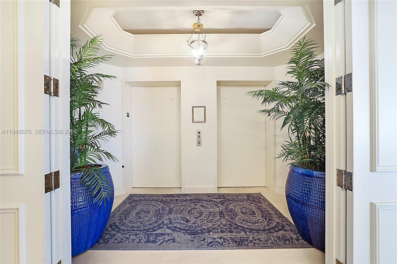 19950 South Beach Road, Unit 4S Jupiter, FL 33469 - Photo 26 of 56 a view of entryway with a rug