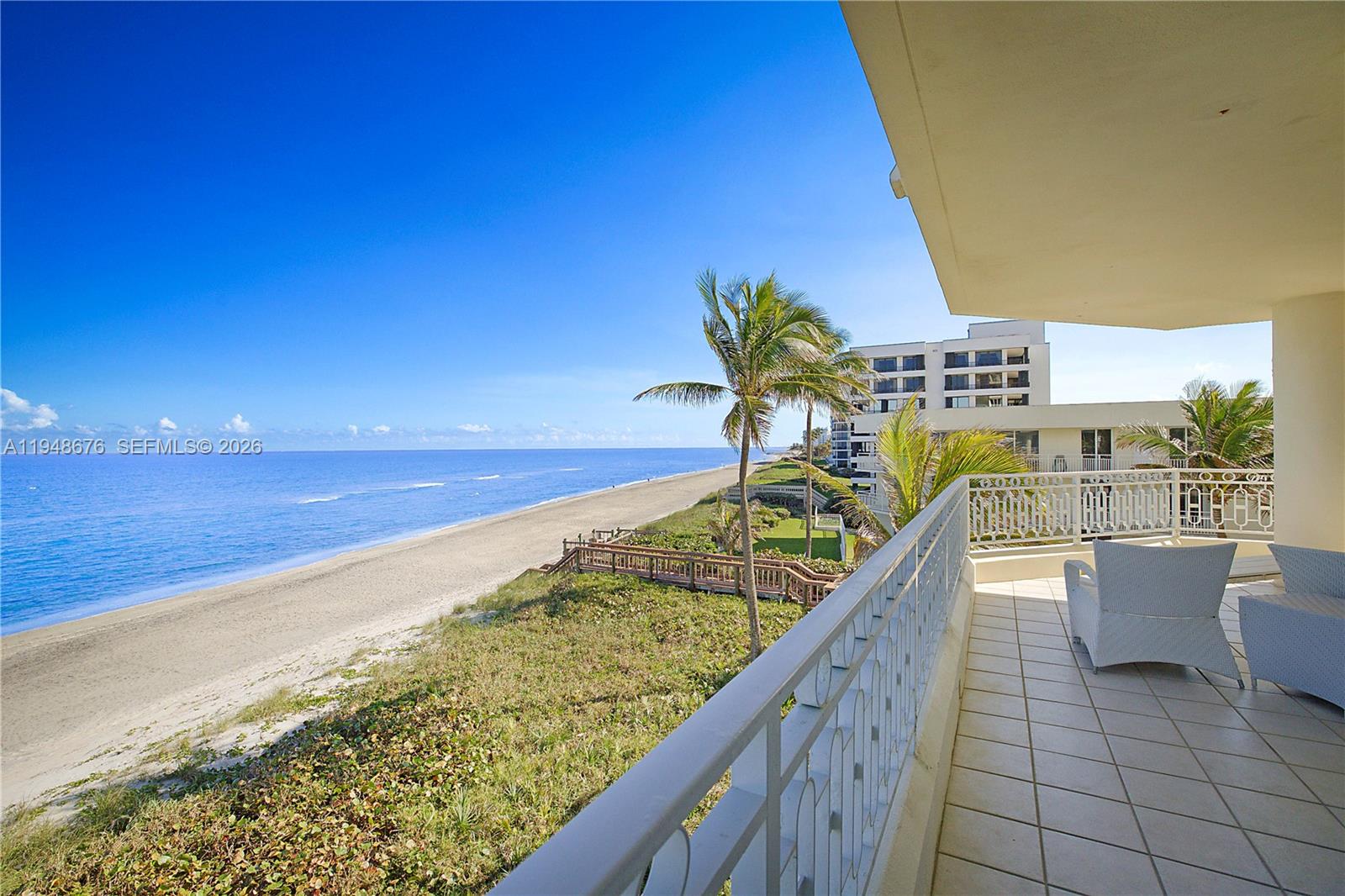 19950 South Beach Road, Unit 4S Jupiter, FL 33469 - Photo 34 of 56 a view of a balcony with an ocean view