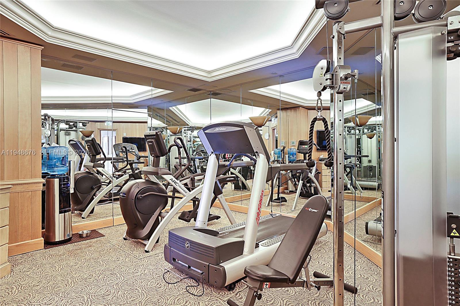 19950 South Beach Road, Unit 4S Jupiter, FL 33469 - Photo 40 of 56 a view of a room with gym equipment