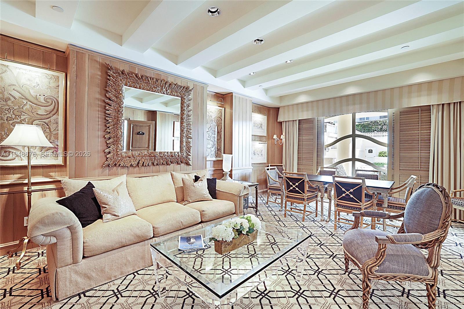 19950 South Beach Road, Unit 4S Jupiter, FL 33469 - Photo 41 of 56 a living room with furniture and a large window