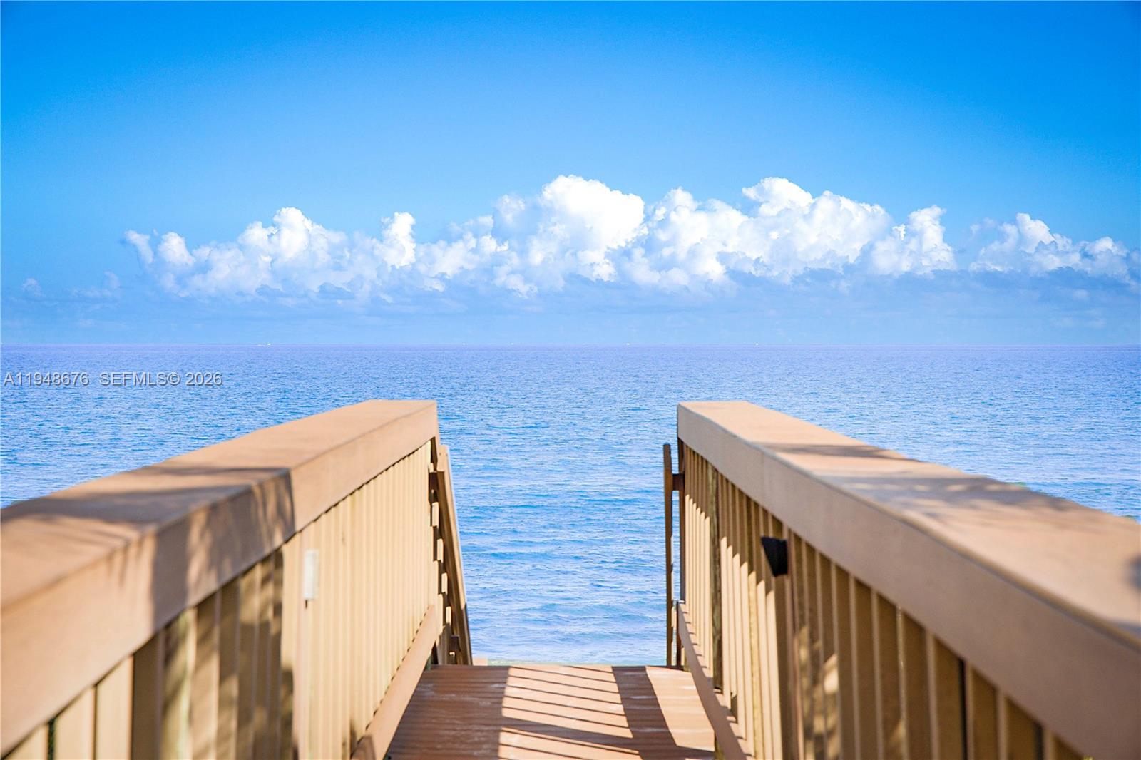 19950 South Beach Road, Unit 4S Jupiter, FL 33469 - Photo 42 of 56 a view of a balcony with an ocean
