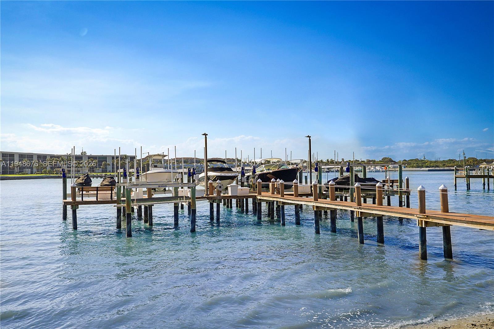 19950 South Beach Road, Unit 4S Jupiter, FL 33469 - Photo 46 of 56 a view of a terrace with seating area