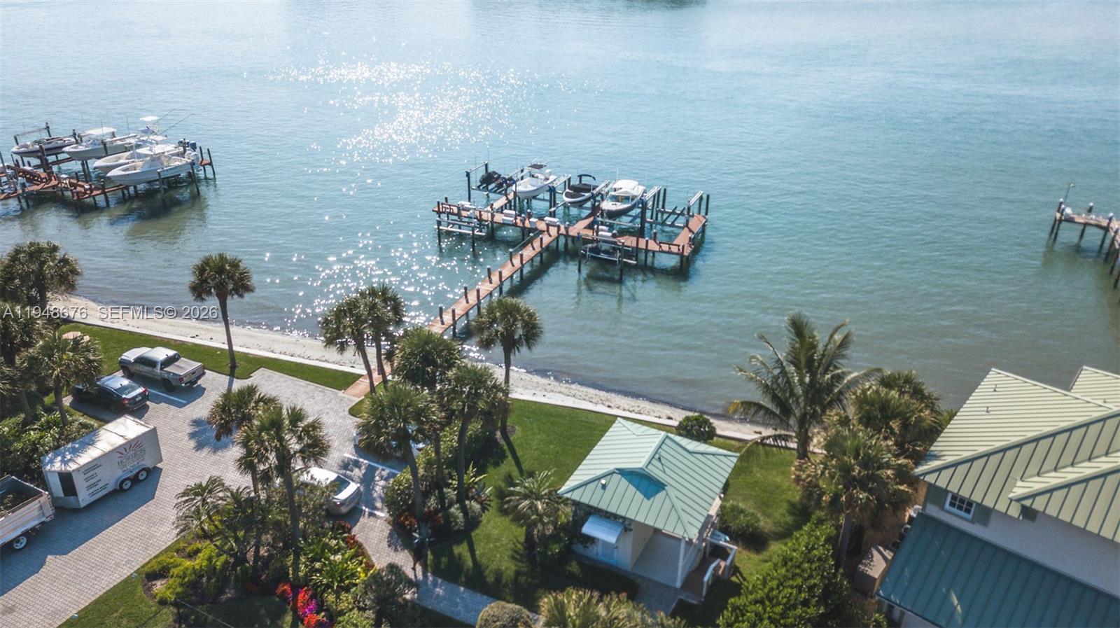 19950 South Beach Road, Unit 4S Jupiter, FL 33469 - Photo 49 of 56 a view of a house with a lake view