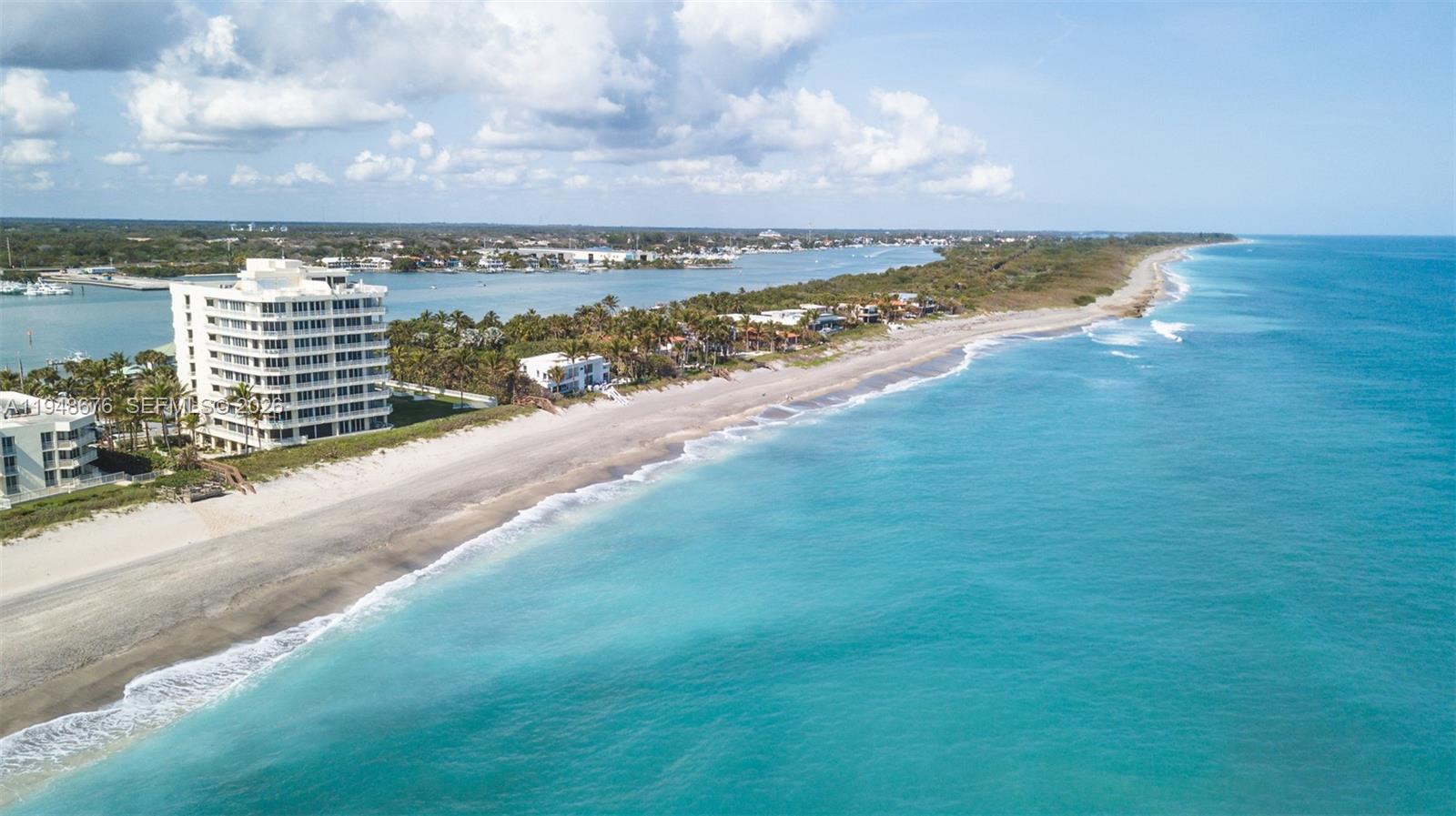19950 South Beach Road, Unit 4S Jupiter, FL 33469 - Photo 53 of 56 a view of a city with an ocean view