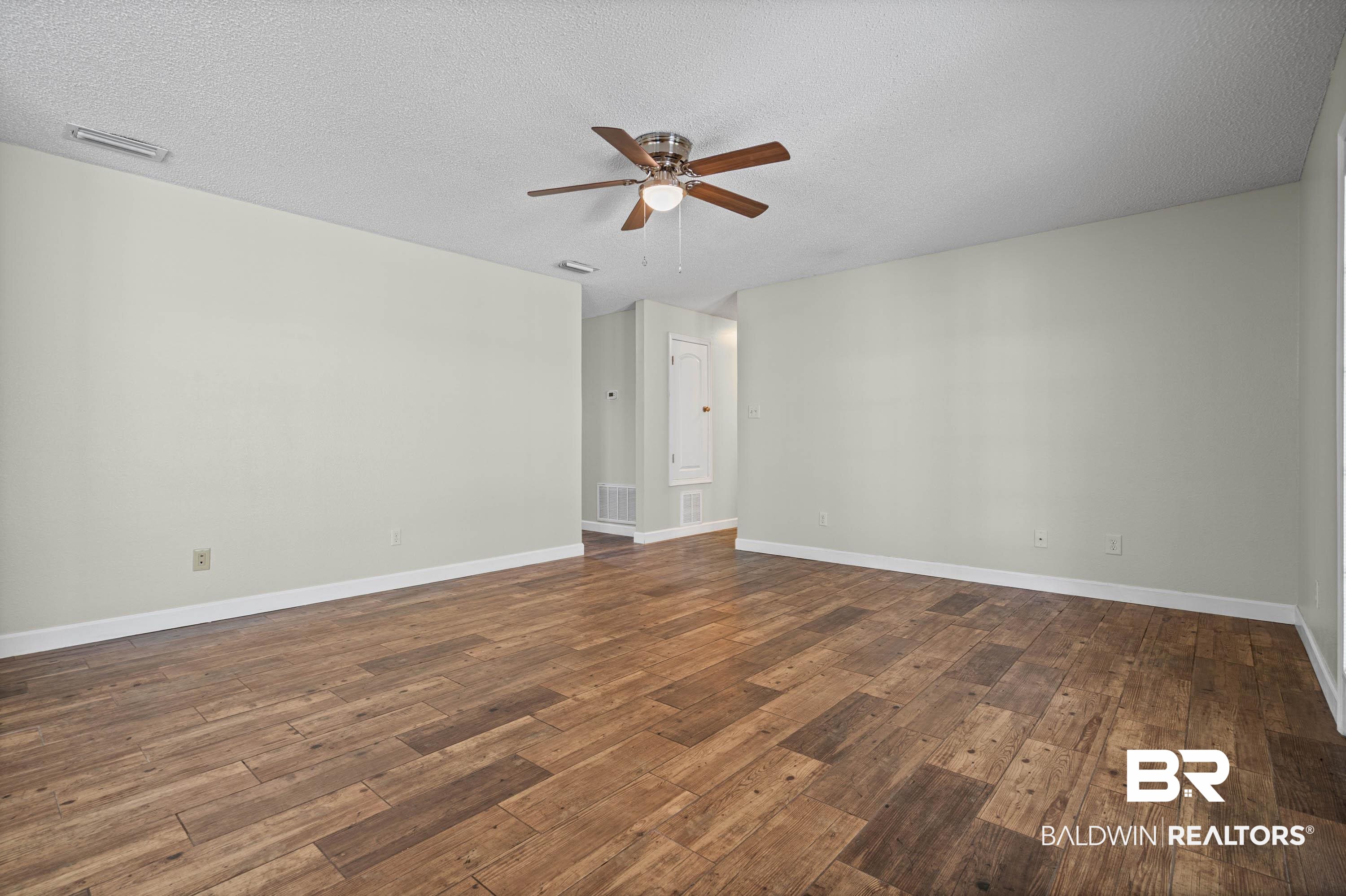 9228 Hammock Road Elberta, AL 36530 - Photo 8 of 30 Dining towards bedrooms