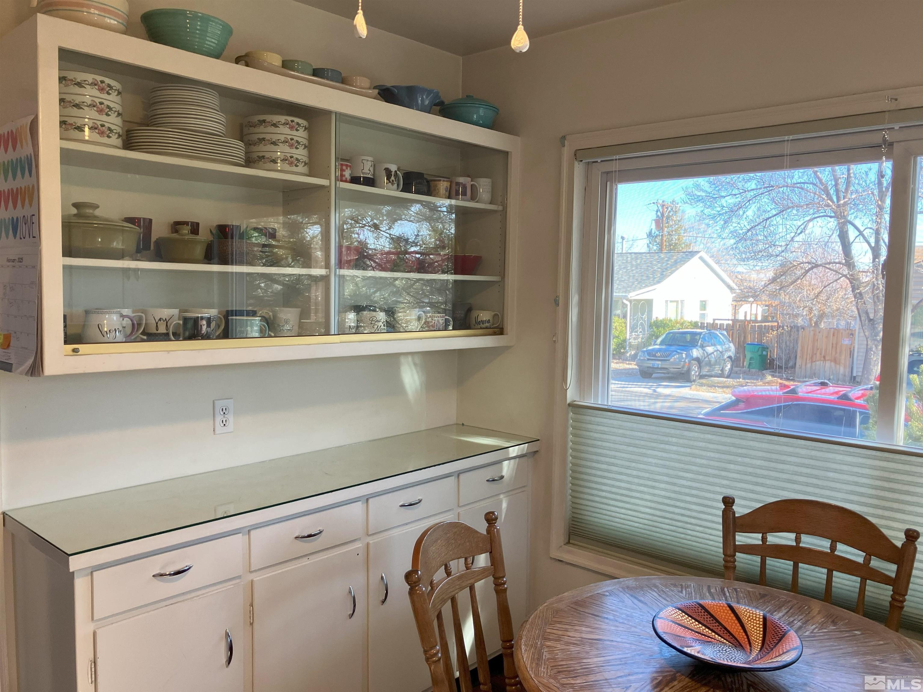 1663 Ordway Avenue Reno, NV 89509 - Photo 4 of 20 a room with furniture and a window