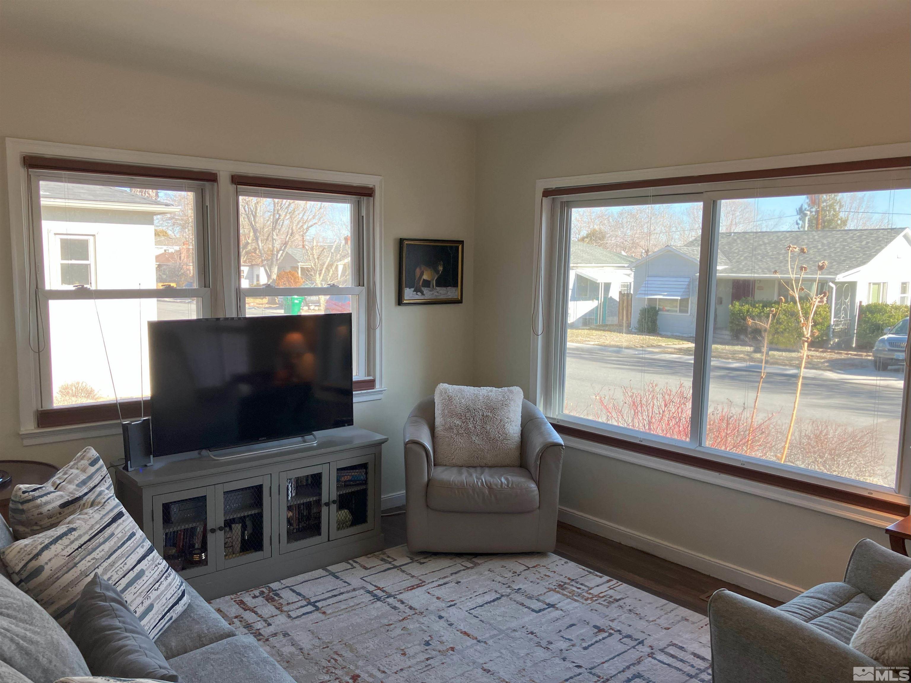 1663 Ordway Avenue Reno, NV 89509 - Photo 5 of 20 a living room with furniture and a flat screen tv