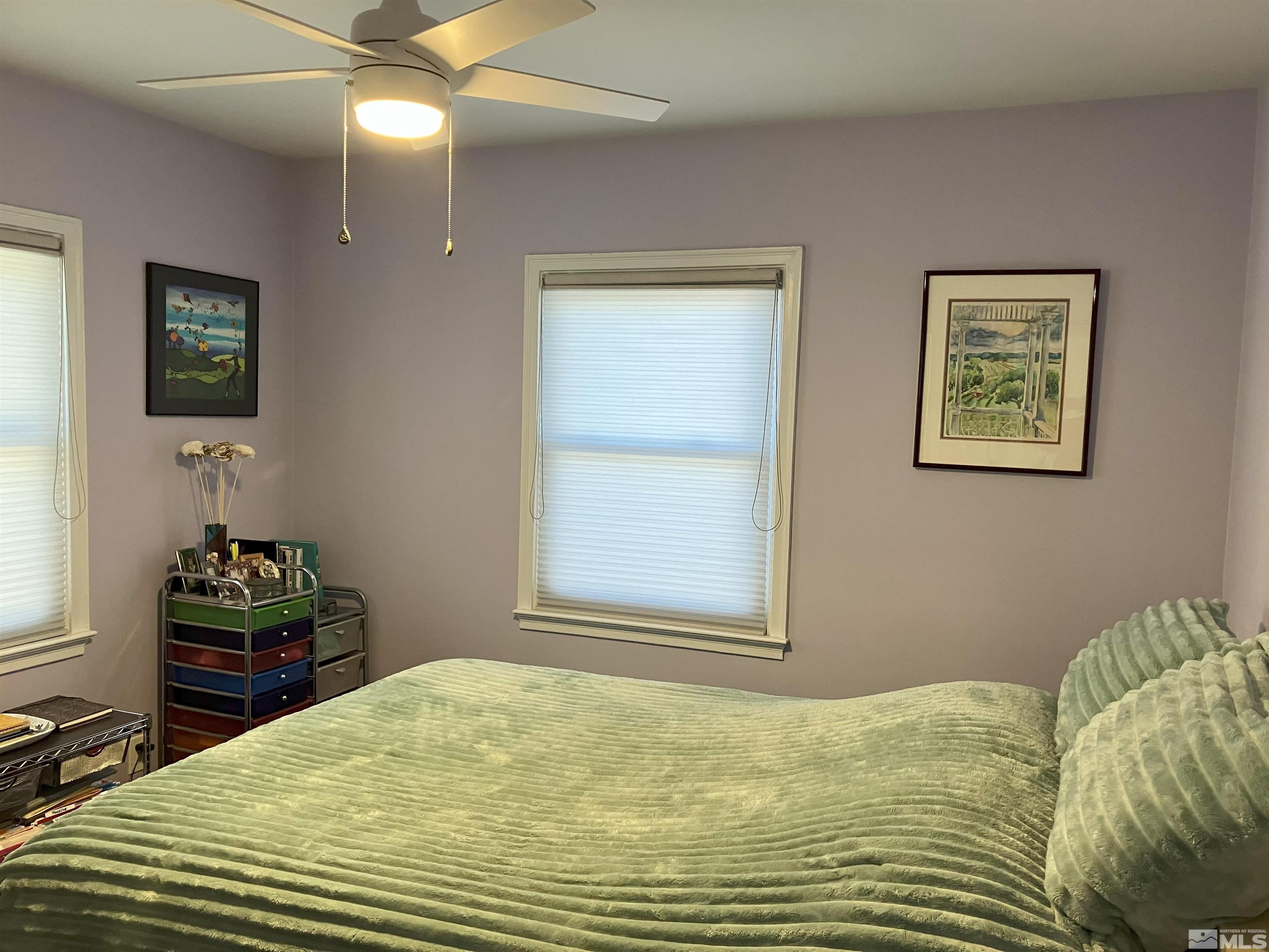 1663 Ordway Avenue Reno, NV 89509 - Photo 7 of 20 a bedroom with a bed and a window