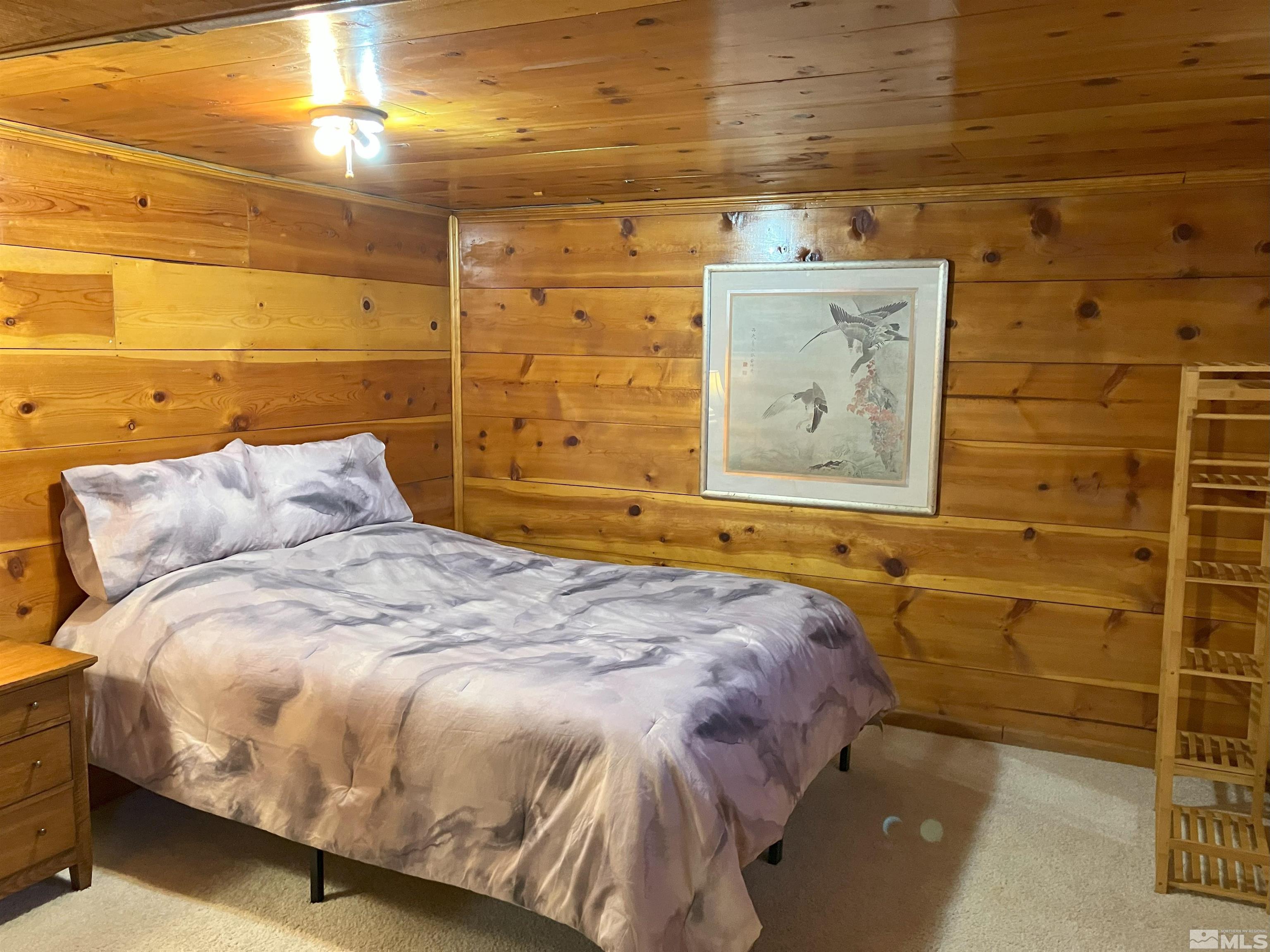 1663 Ordway Avenue Reno, NV 89509 - Photo 9 of 20 a bed sitting in a bathroom next to a window