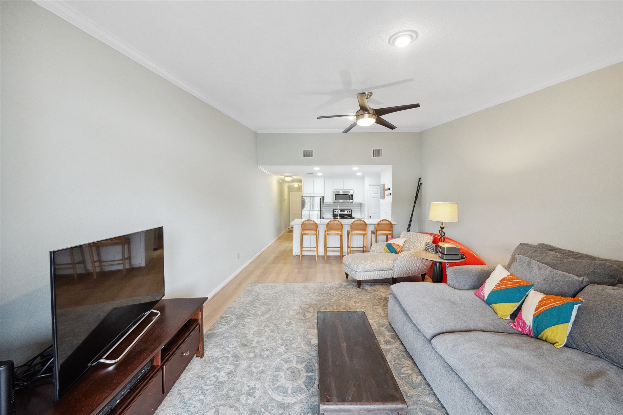 801 River Road, Unit F120 Montgomery, TX 77356 - Photo 12 of 18 A view in from your private patio --Stylishly updated, this one bedroom condo is easy-living and easy-maintenance for Lock-n-Leave or Full-Time living at Lake Conroe. 801 River Rd #F120.