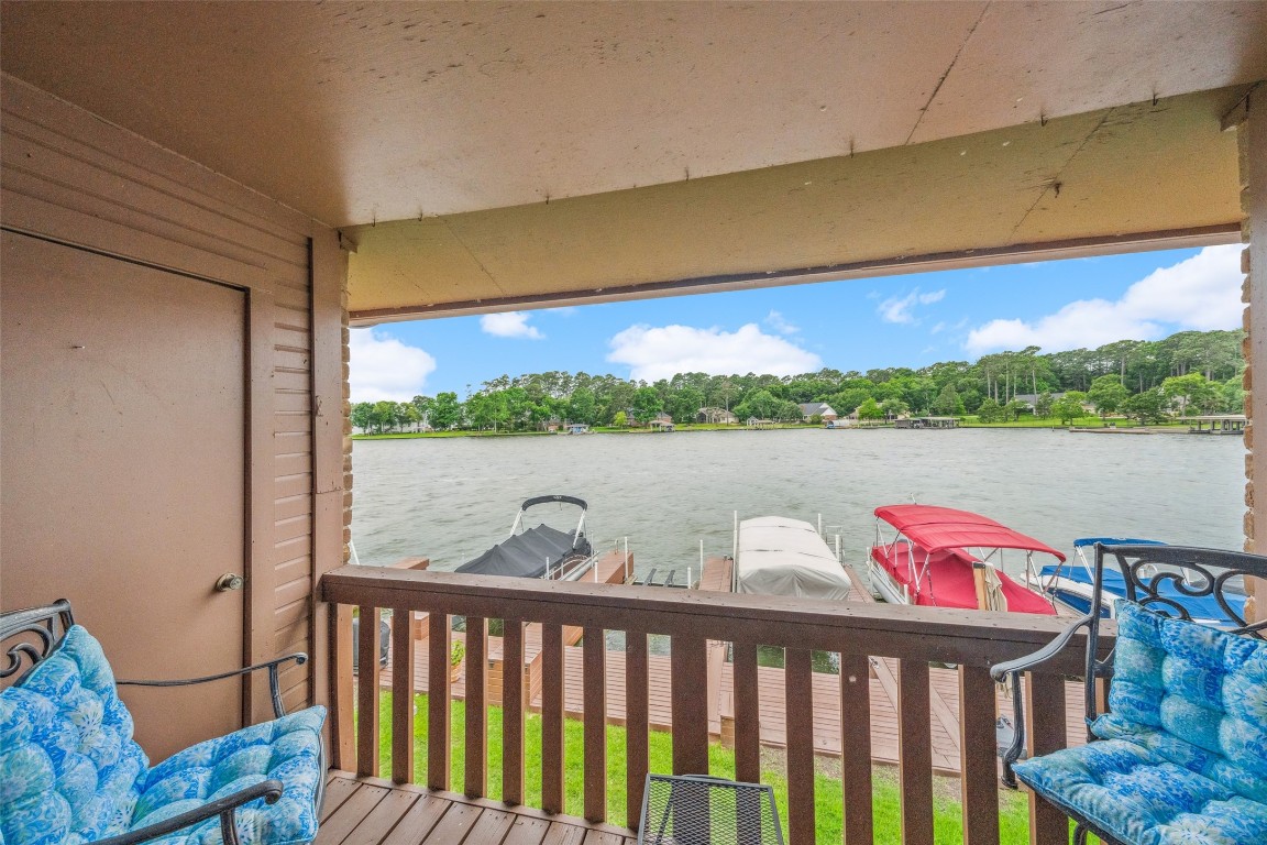 801 River Road, Unit F120 Montgomery, TX 77356 - Photo 2 of 18 a view of a two chairs in the balcony
