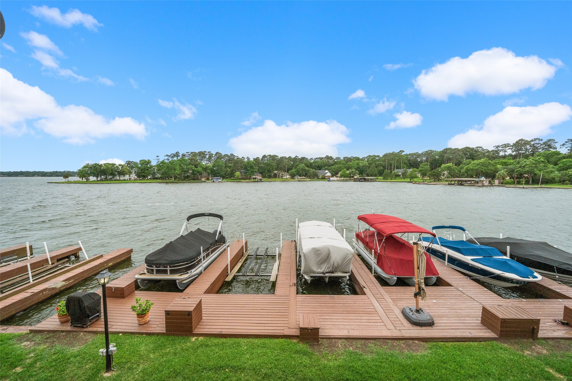 801 River Road, Unit F120 Montgomery, TX 77356 - Photo 4 of 18 Representative Photo of docks and Boat slips of this Community. HOA Repair on Bulkhead ongoing after last storm. See Disclosures for Boat Slip # and Boat Slip information. 801 River Road #F120, Montgomery, Texas.