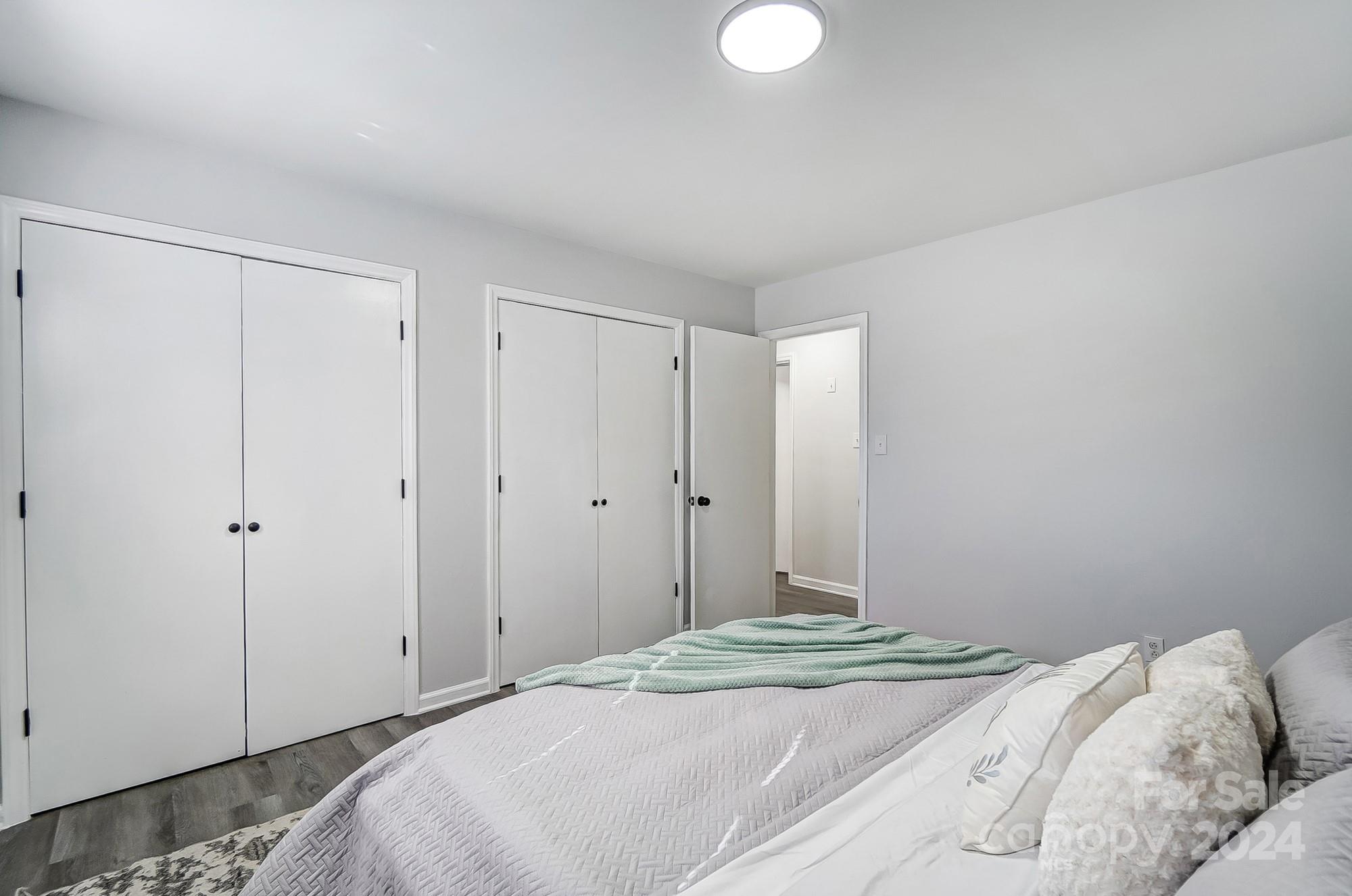 6524 Eaglecrest Road Charlotte, NC 28212 - Photo 21 of 48 a bedroom with a bed and a window