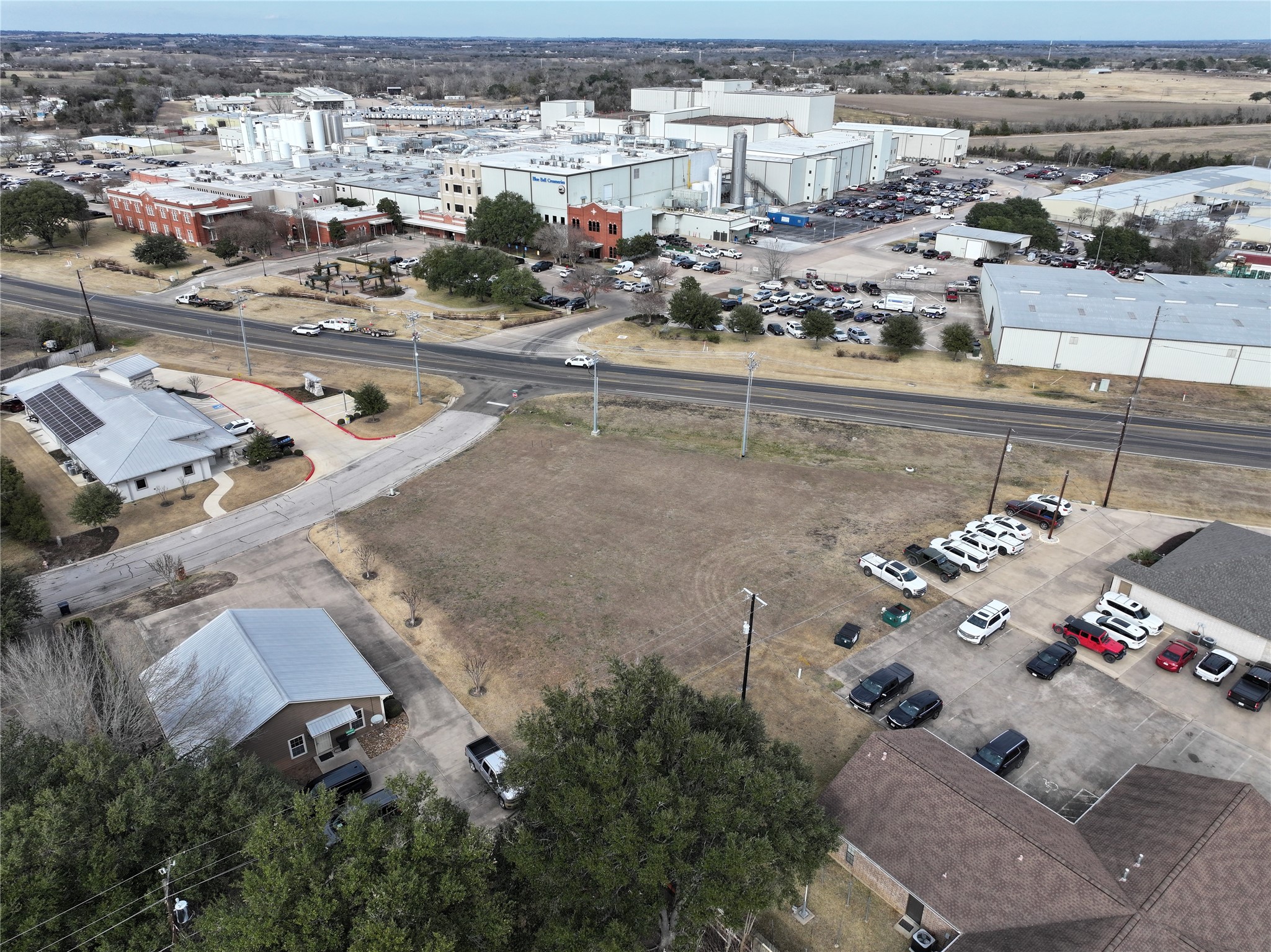 0 Longhofer Street Brenham, TX 77833 - Photo 1 of 10 an aerial view of a building with outdoor space