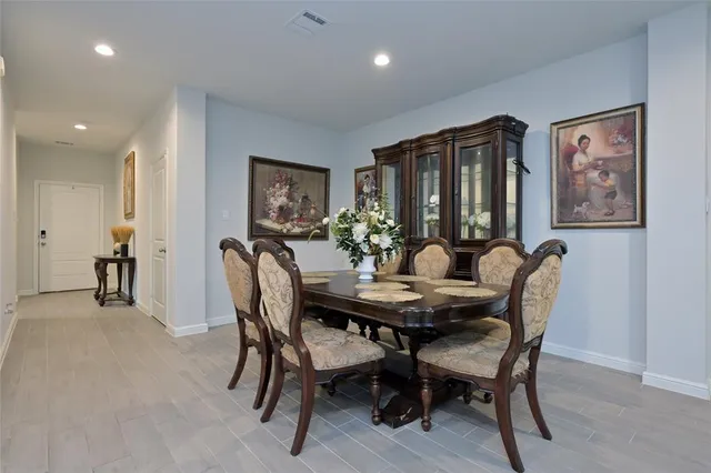 a view of a dining room with furniture