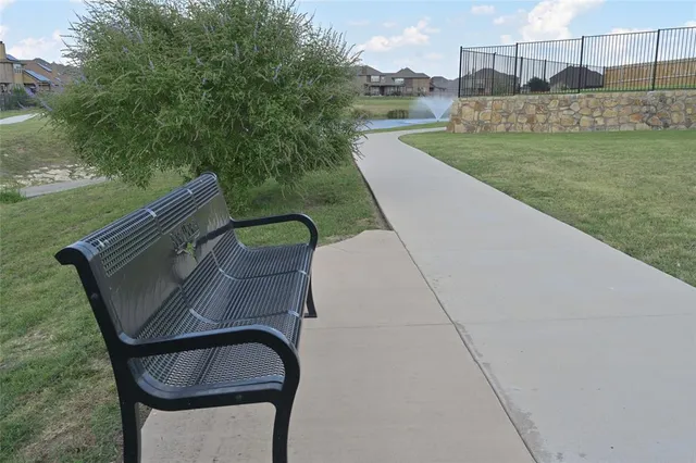 a view of yard with furniture and yard