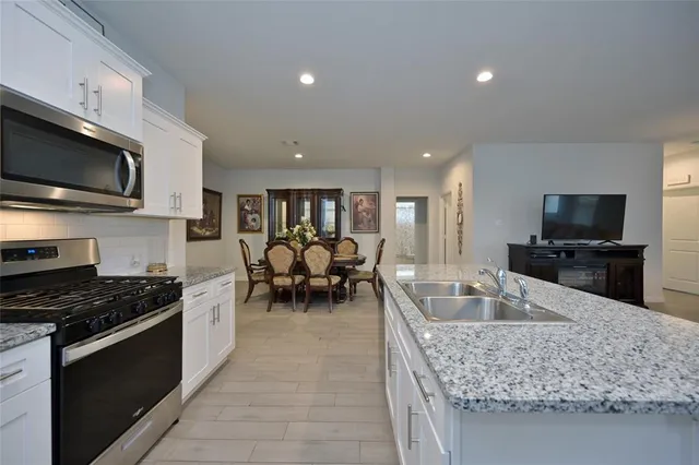 a kitchen with granite countertop lots of counter top space