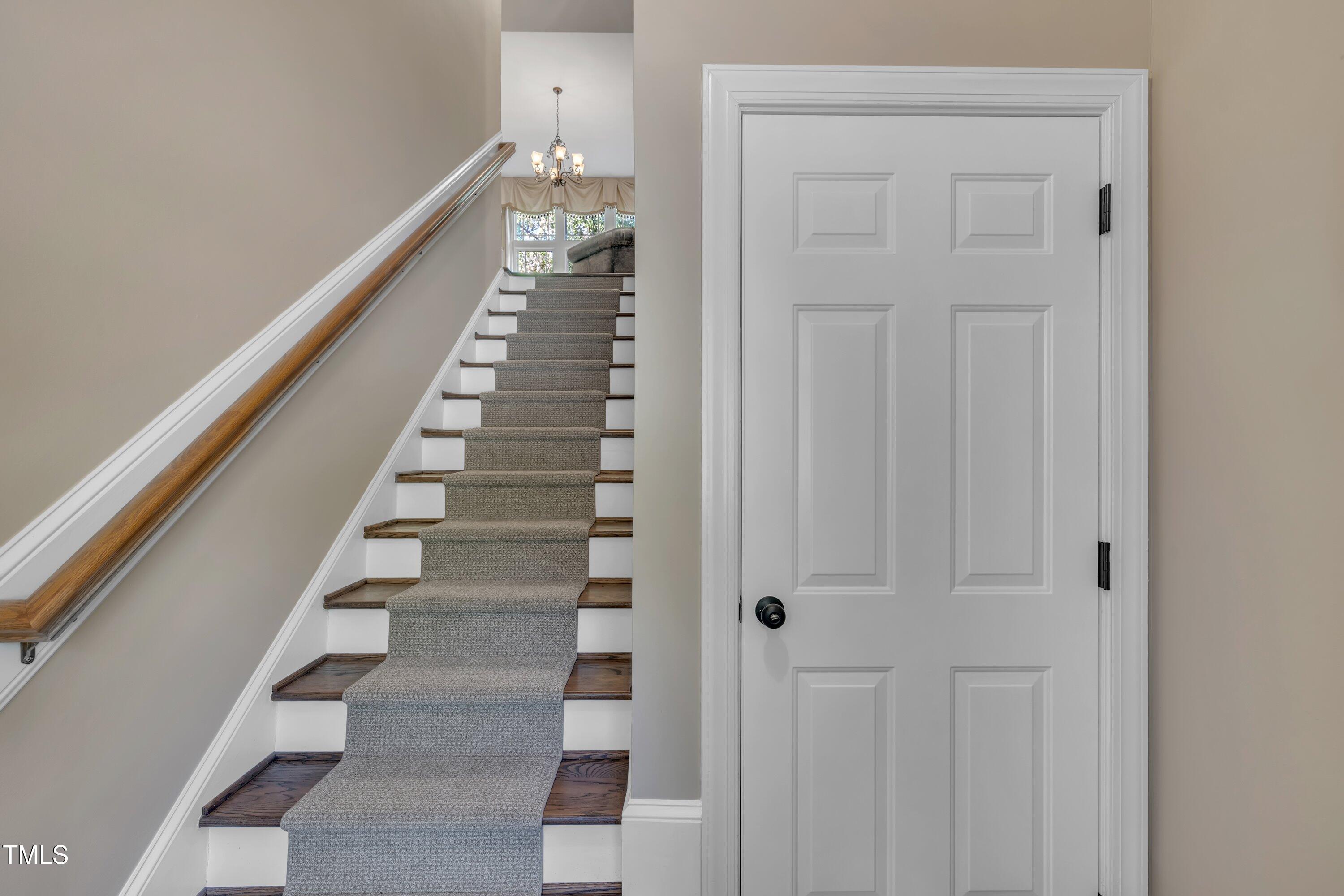 4802 Glenmist Court Raleigh, NC 27612 - Photo 35 of 52 a view of entryway with wooden floor
