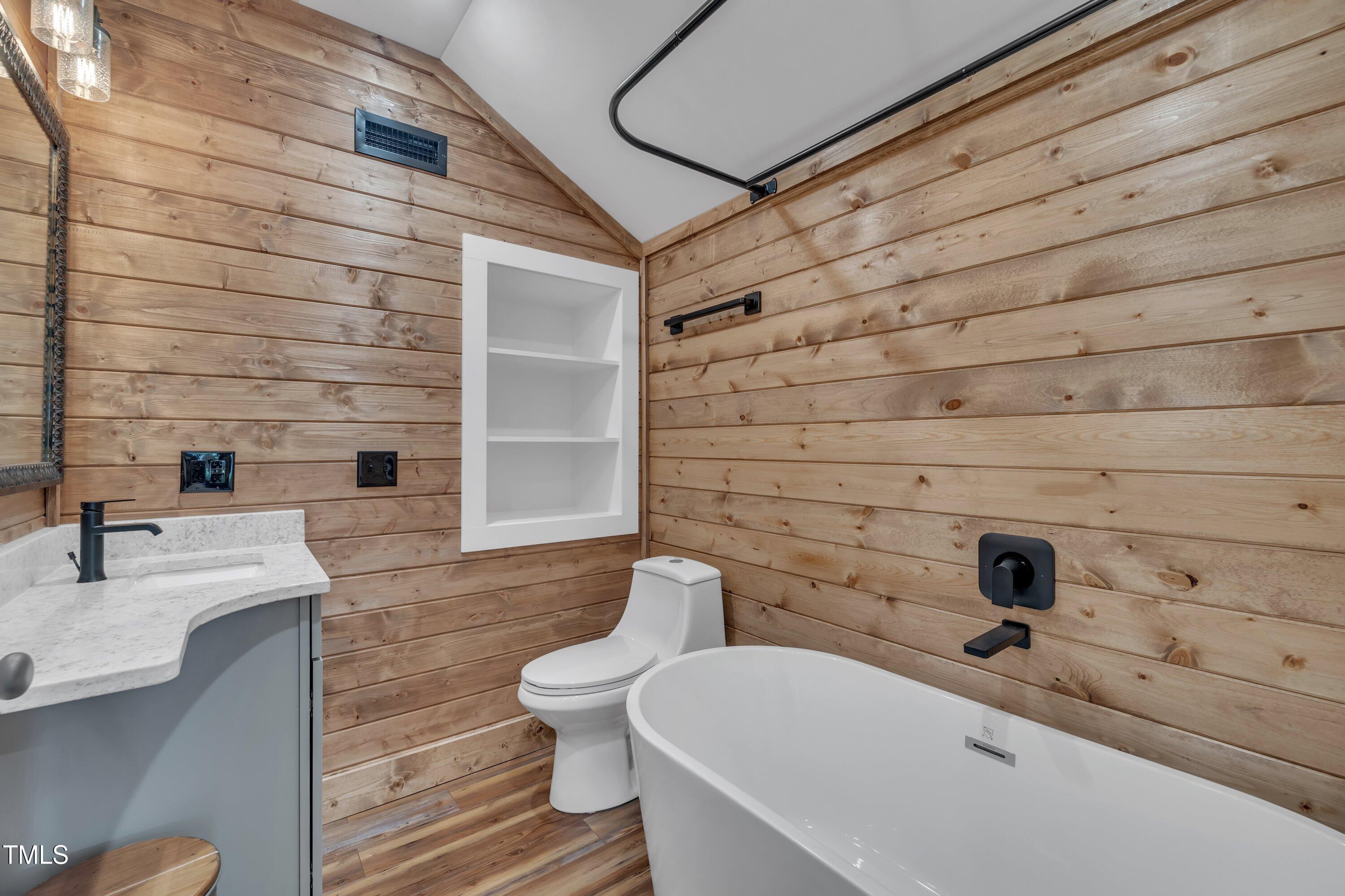 4802 Glenmist Court Raleigh, NC 27612 - Photo 45 of 52 a bathroom with a sink and toilet
