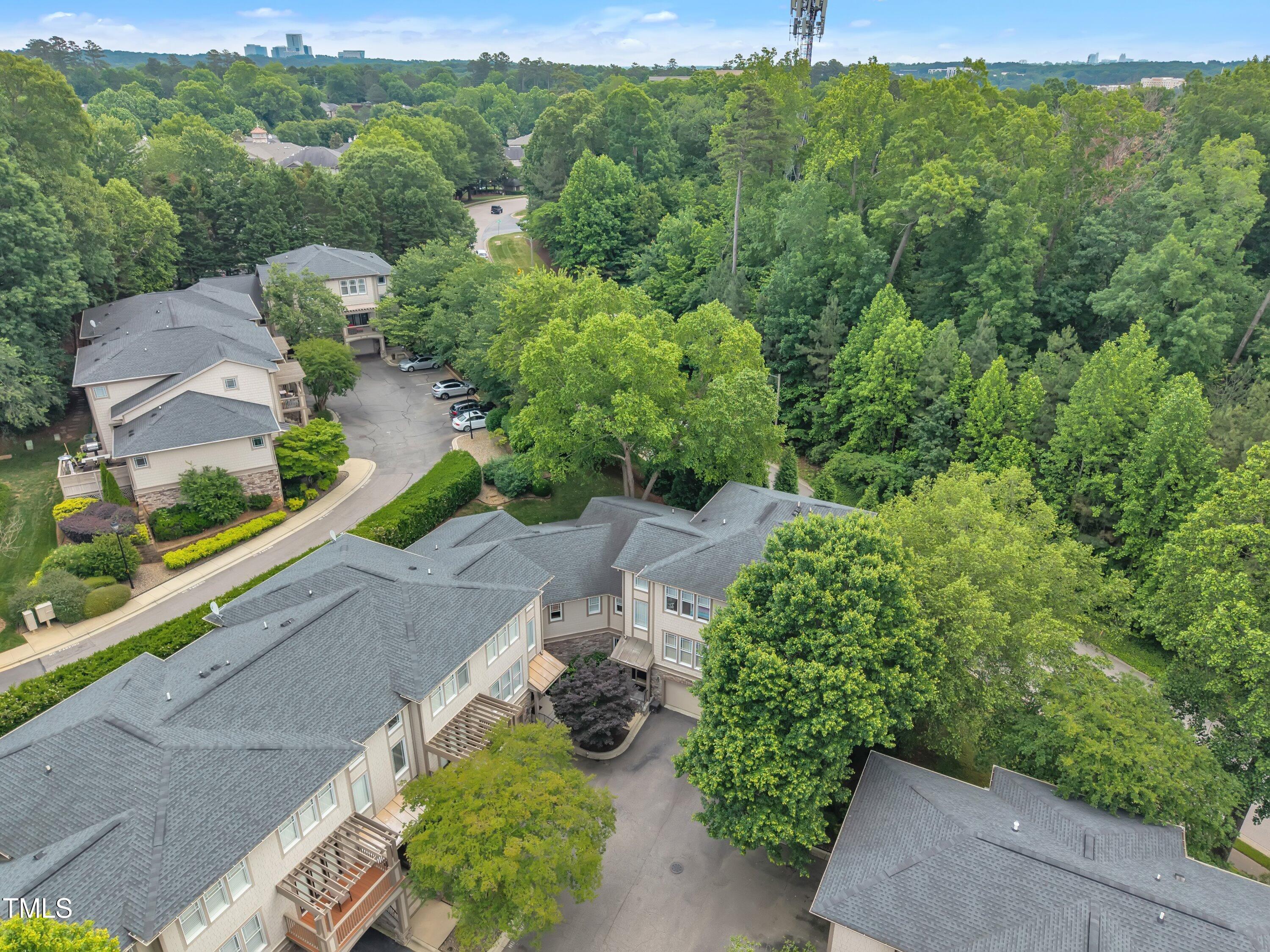 4802 Glenmist Court Raleigh, NC 27612 - Photo 48 of 52 an aerial view of a house with a yard