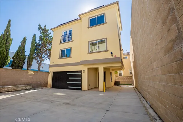 a view of a house with a garage