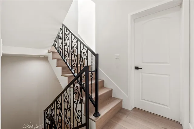 a view of entryway with wooden floor
