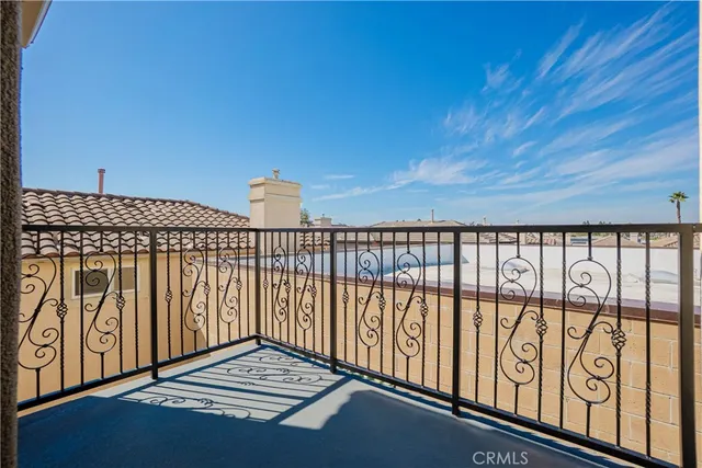 a view of a street from a balcony