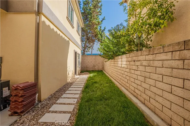 a view of a back yard of the house
