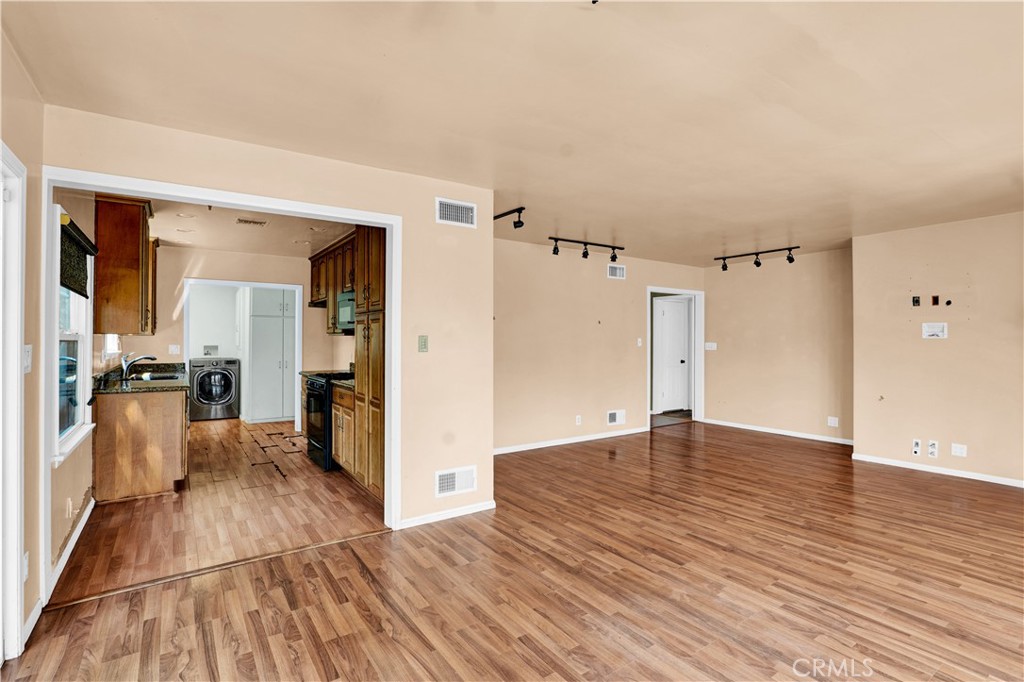 8048 Etiwanda Avenue Reseda, CA 91335 - Photo 6 of 16 wooden floor in an empty room