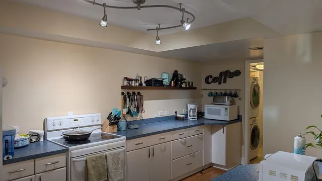 a view of workspace with cabinets