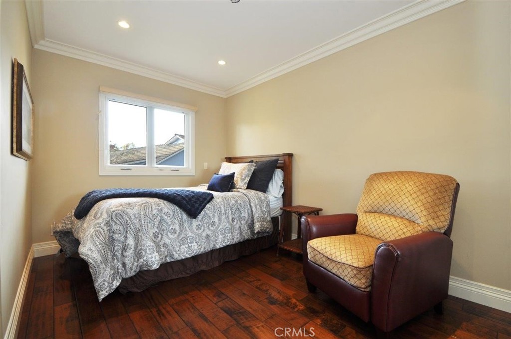 1525 Chelsea Road Palos Verdes Estates, CA 90274 - Photo 17 of 29 a bedroom with a bed and a couch