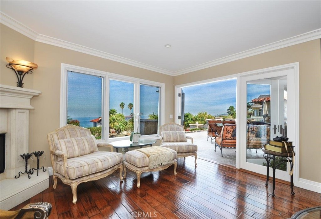 1525 Chelsea Road Palos Verdes Estates, CA 90274 - Photo 6 of 29 a living room with furniture and a large window