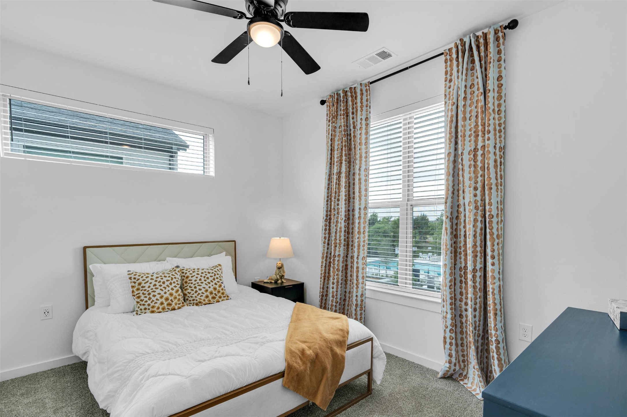 1652-101 Spaniel Avenue Rowlett, TX 75089 - Photo 18 of 41 a bedroom with a bed and a window