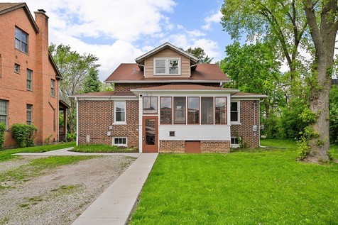 1811 Prairie Street Glenview, IL 60025 - Photo 15 of 22 front view of a house with a yard
