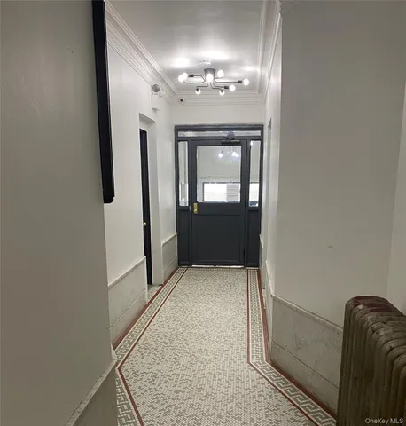 wooden floor in an empty room with a mirror