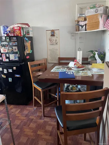 a view of a workspace with furniture