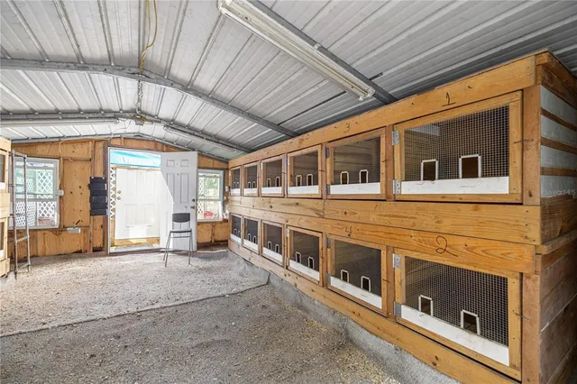 a view of a hallway with wooden floor and a fireplace
