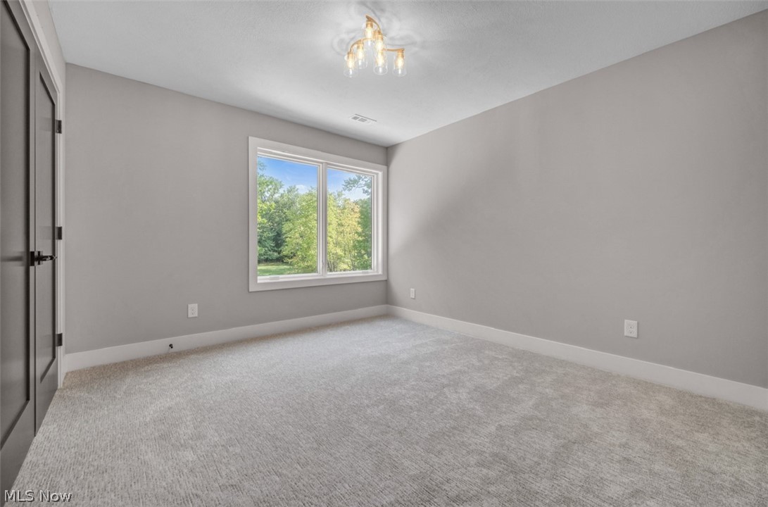 4009 Brainard Road Beachwood, OH 44122 - Photo 38 of 50 Bedroom featuring light colored carpet