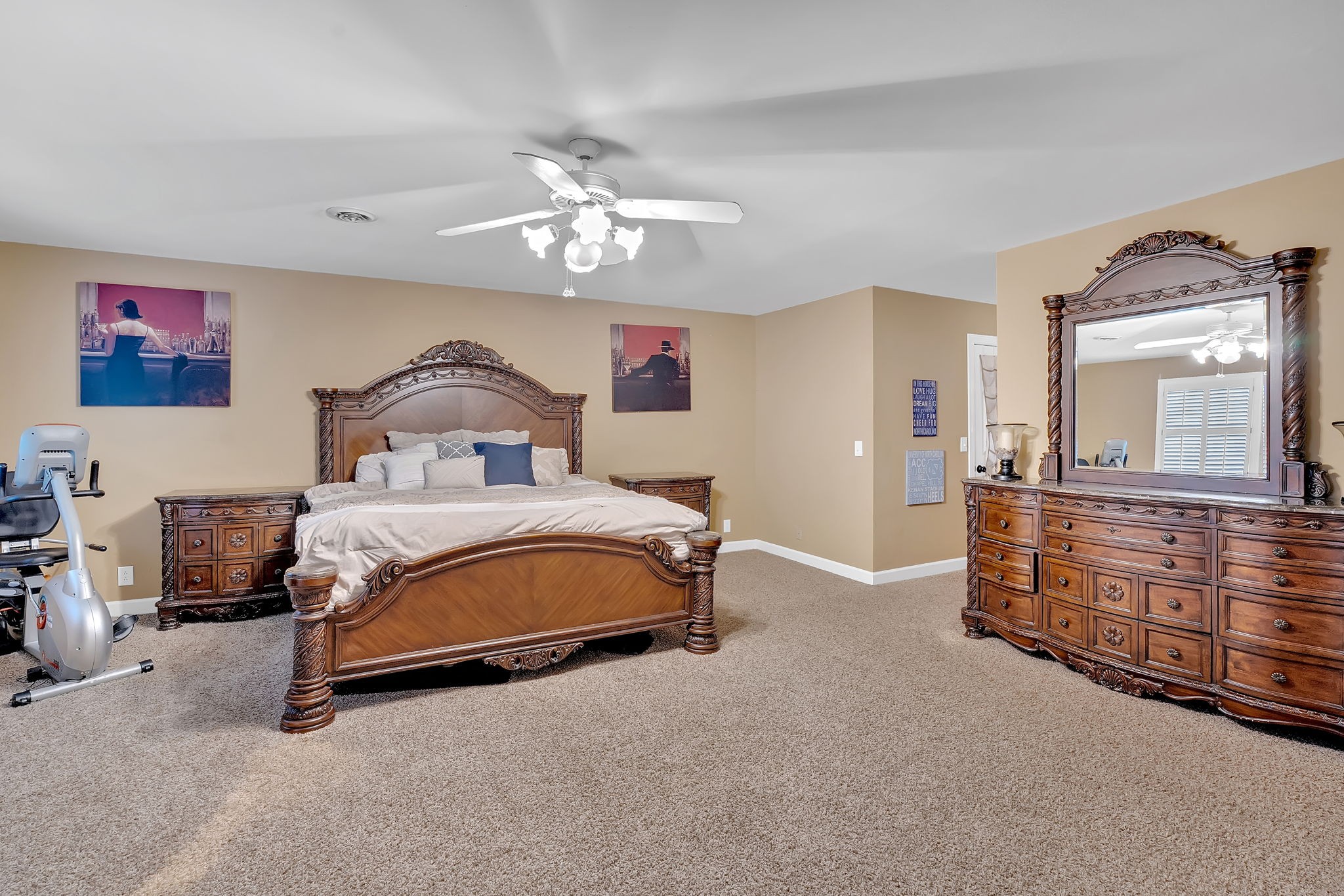 2115 Battleground Drive Murfreesboro, TN 37129 - Photo 28 of 40 a bedroom with a bed and a chandelier
