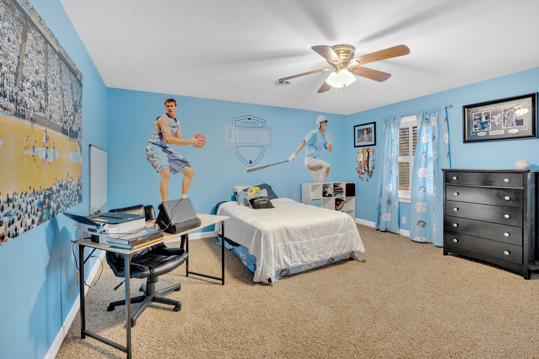 2115 Battleground Drive Murfreesboro, TN 37129 - Photo 30 of 40 a bedroom with a bed and a chandelier