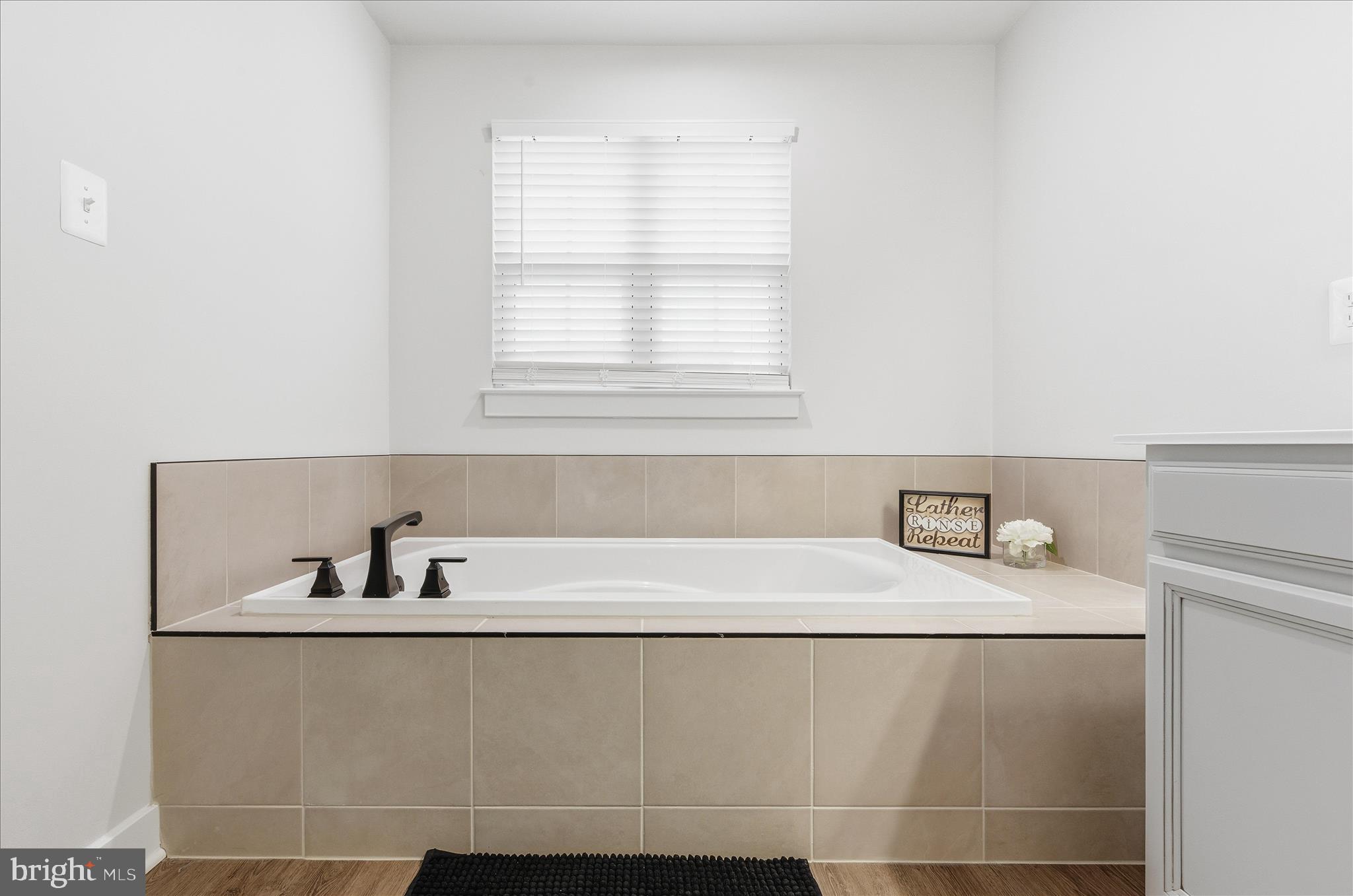 516 Rushbrook Road Martinsburg, WV 25403 - Photo 14 of 86 a white bath tub sitting next to a white sink