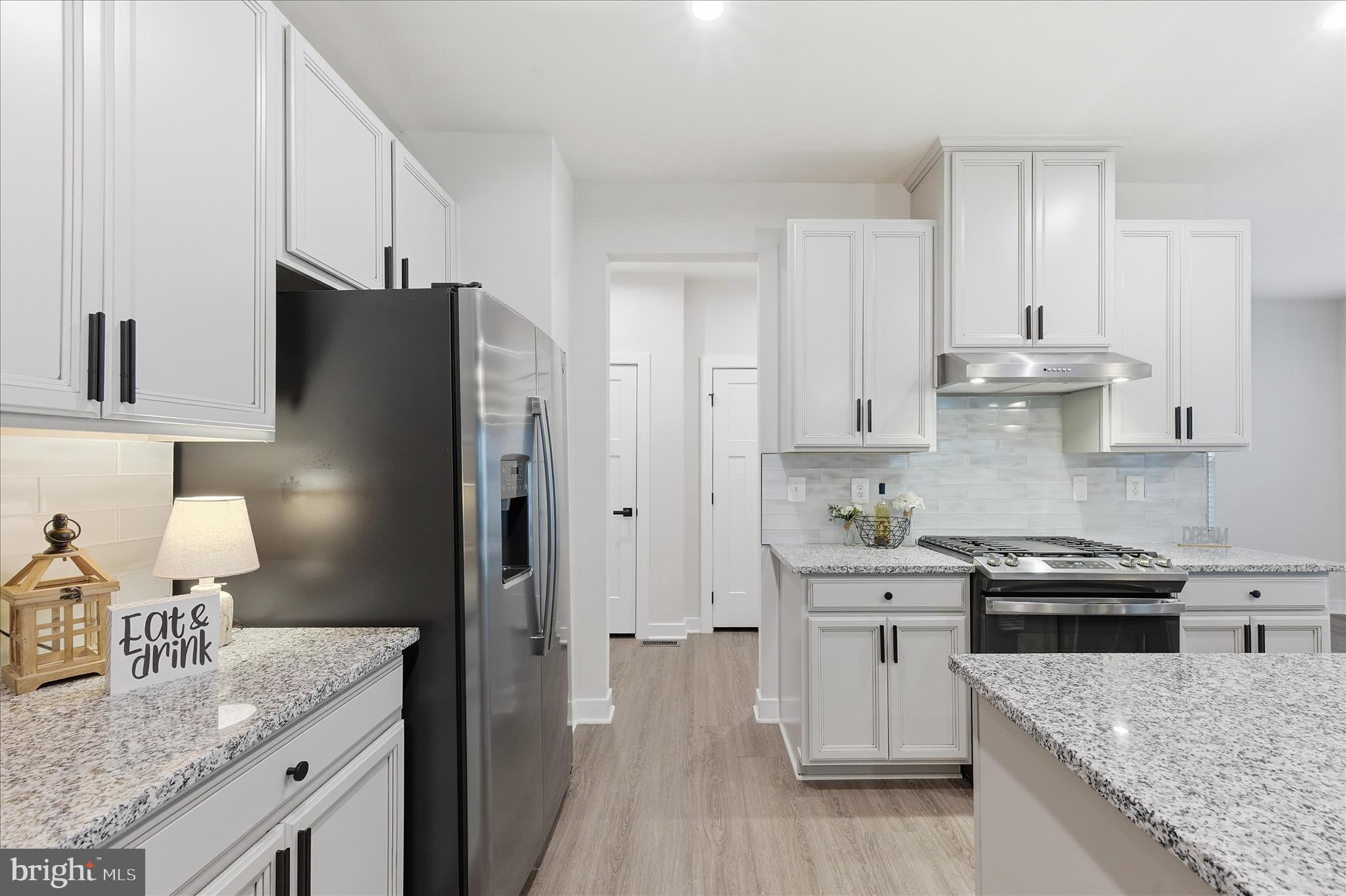516 Rushbrook Road Martinsburg, WV 25403 - Photo 27 of 86 a kitchen with granite countertop a refrigerator stove and sink