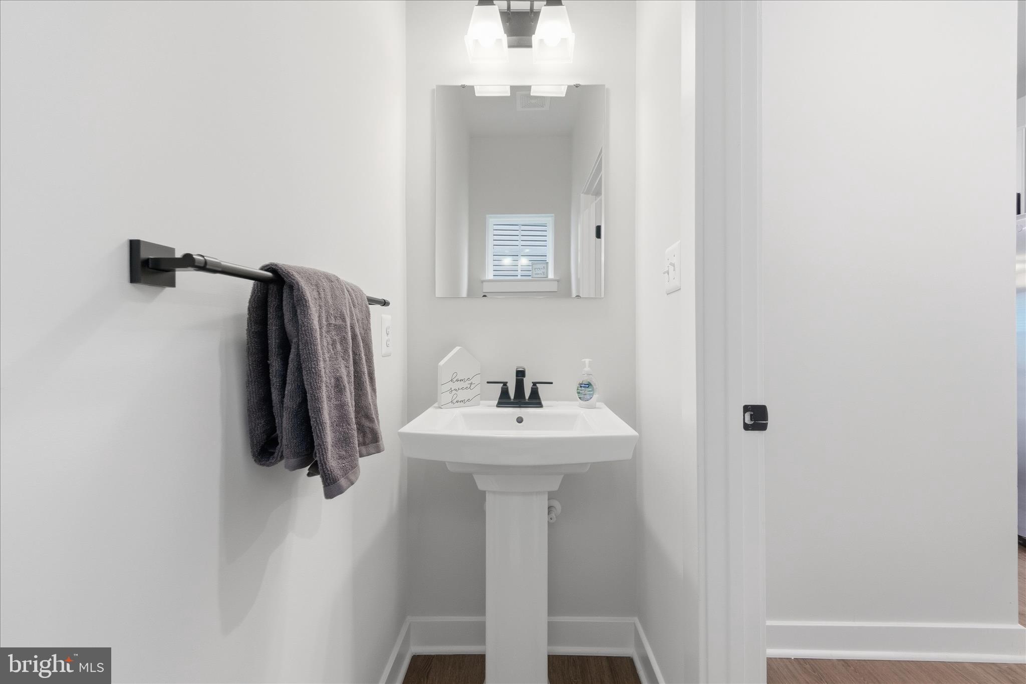 516 Rushbrook Road Martinsburg, WV 25403 - Photo 29 of 86 a bathroom with a sink and mirror