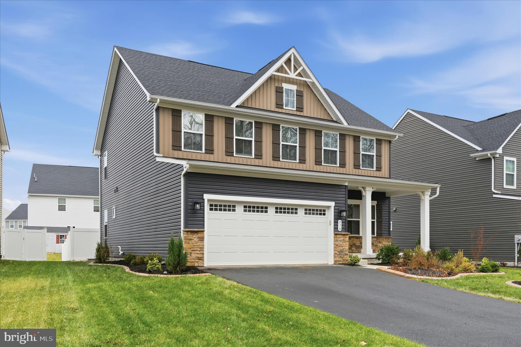 516 Rushbrook Road Martinsburg, WV 25403 - Photo 61 of 86 a front view of a house with a garden and yard