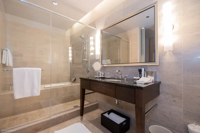 a bathroom with a bathtub and a sink