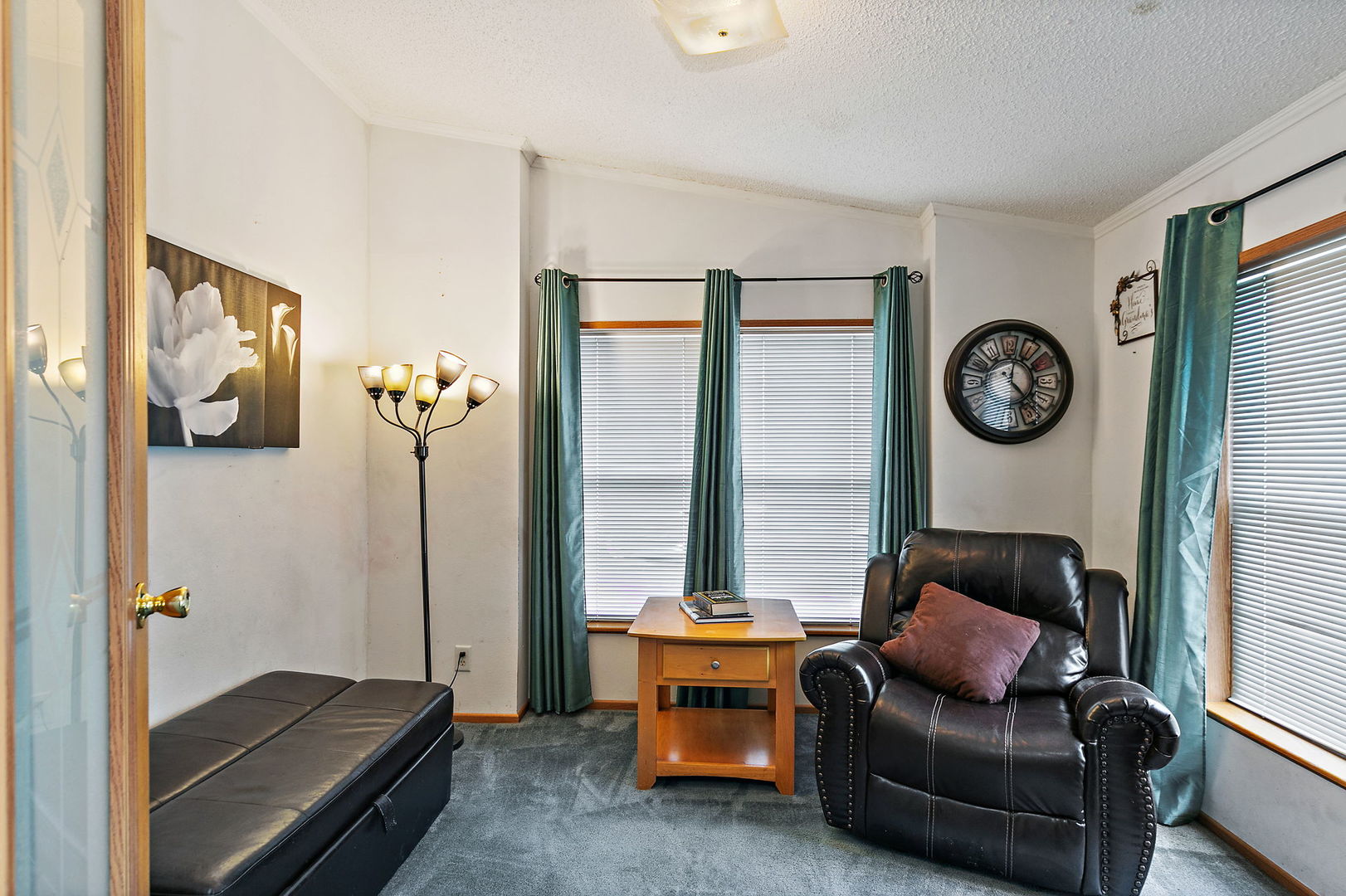 117 Parkwood Road Elgin, IL 60123 - Photo 13 of 16 a room with furniture and a large window