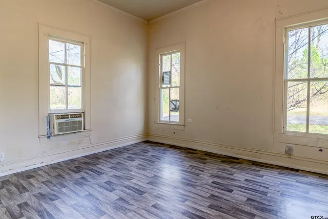 a view of workspace with wooden floor