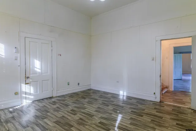 an empty room with windows
