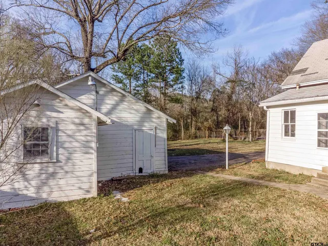 a house view with a outdoor space